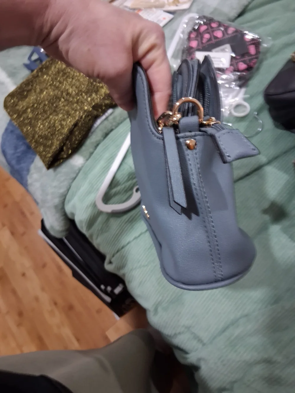 Small Pebbled Light Gray Crossbody Bag with Gold Accent